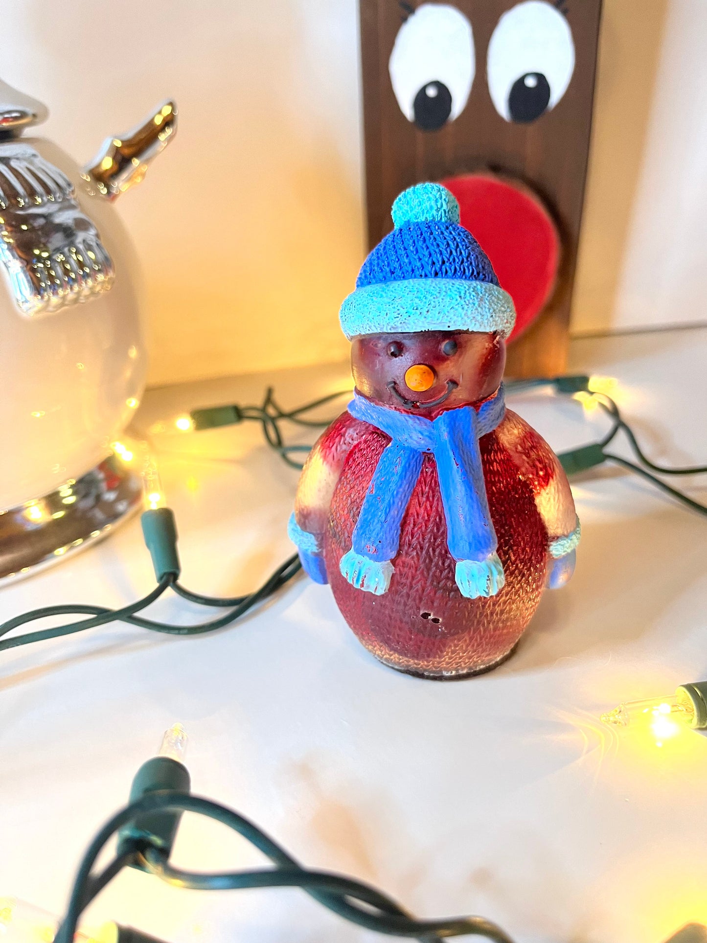 Red snowman with blue