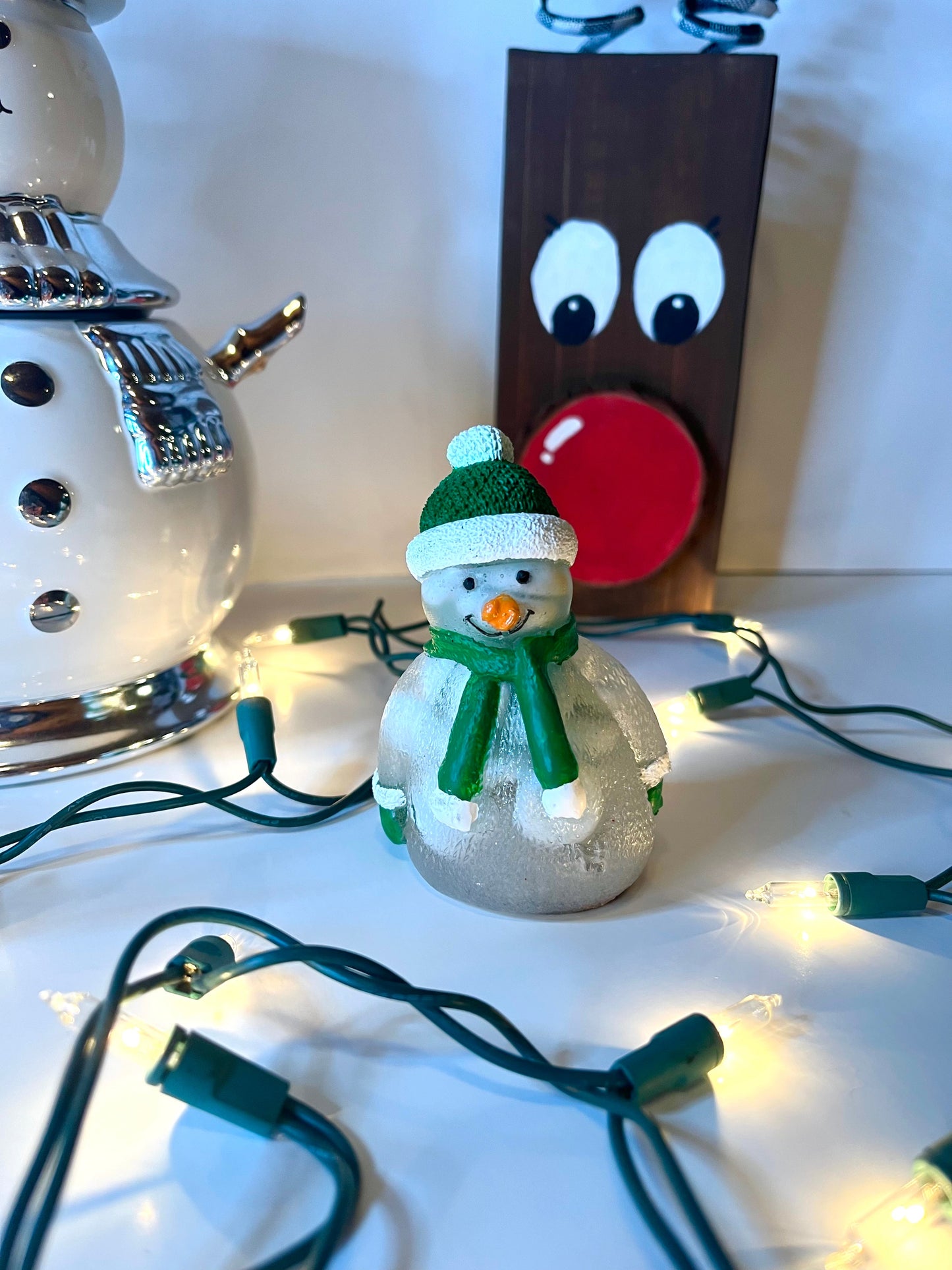 White body snowman with white and green