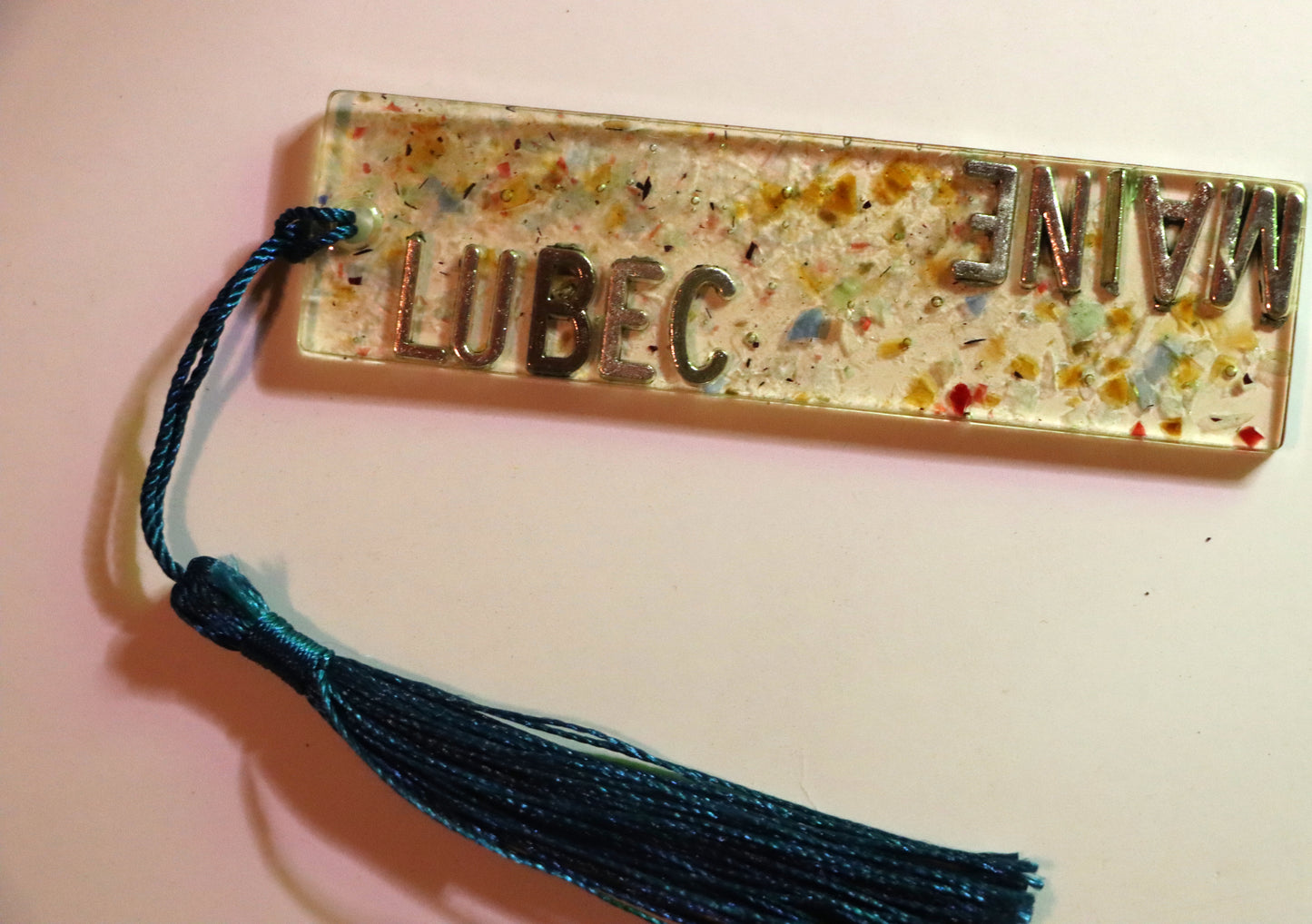 Multicolor "Lubec Maine" bookmark with dark blue tassel